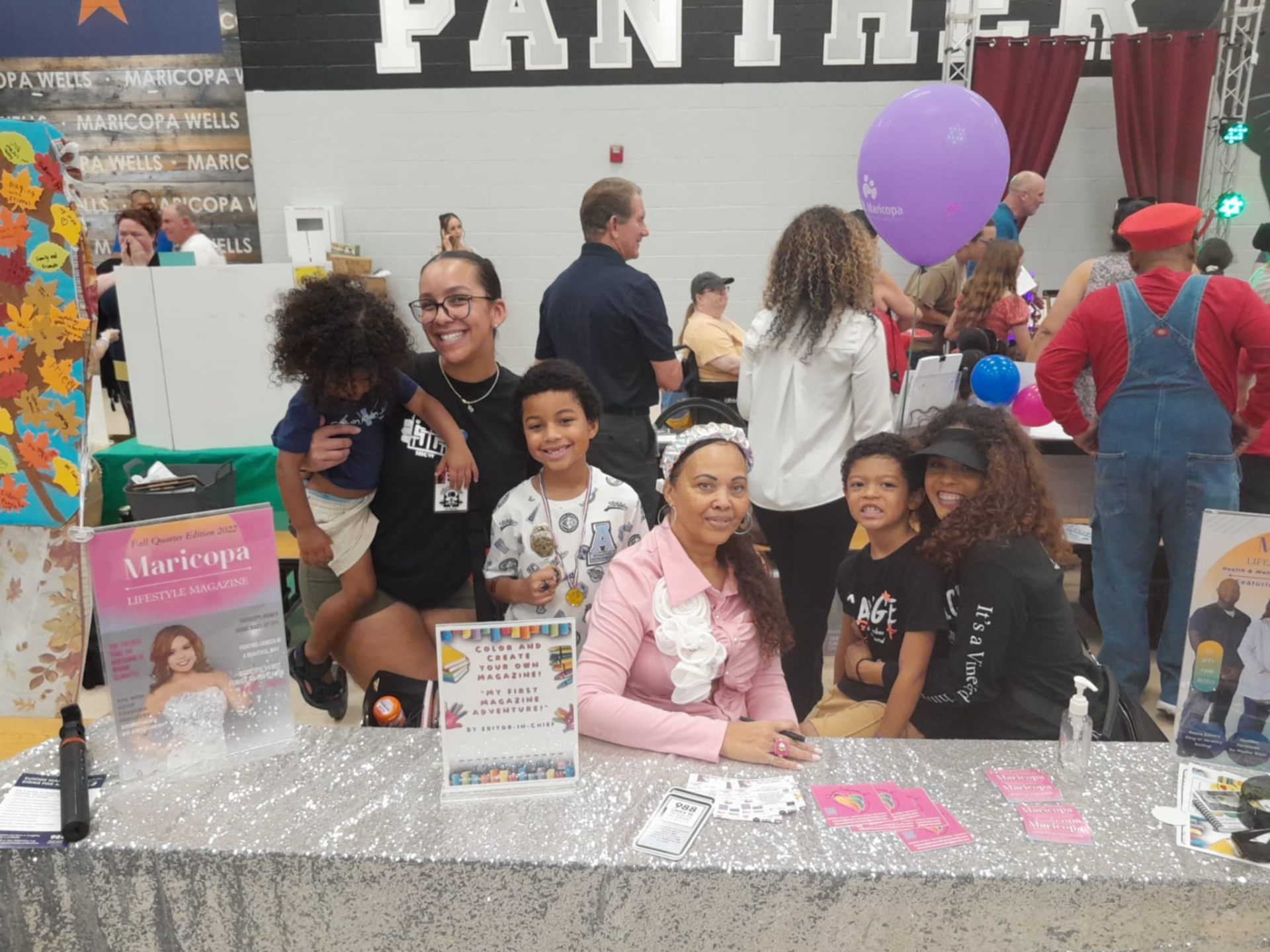 Chrystal at a Maricopa community table with families